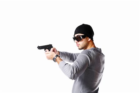 simsearch:400-04163139,k - Portrait of young trendy african man posing with handgun Stock Photo - Budget Royalty-Free & Subscription, Code: 400-04791017