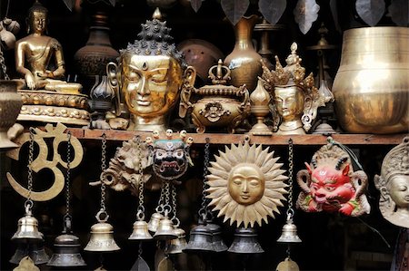 souvenir masks - Copper souvenirs at a market of Kathmandu Nepal Stock Photo - Budget Royalty-Free & Subscription, Code: 400-04791039