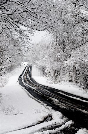 simsearch:400-07215754,k - A snow storm on a mountain two lane highway Stock Photo - Budget Royalty-Free & Subscription, Code: 400-04791238