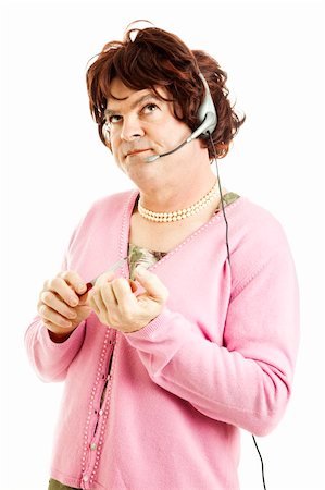 simsearch:841-06031350,k - Humorous photo of a man in a dress, symbolizing that you don't know who you're really talking to when you dial a 900 number. Stock Photo - Budget Royalty-Free & Subscription, Code: 400-04792201