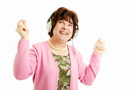 simsearch:841-06031350,k - Funny photo of a female impersonator with headphones on, dancing to the music.  Isolated. Stock Photo - Budget Royalty-Free & Subscription, Code: 400-04792203