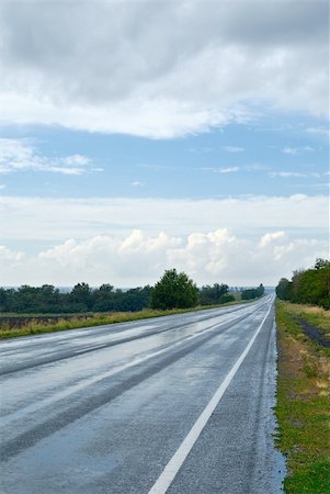 simsearch:400-05112302,k - landscape with a wet asphalt road Stock Photo - Budget Royalty-Free & Subscription, Code: 400-04793535