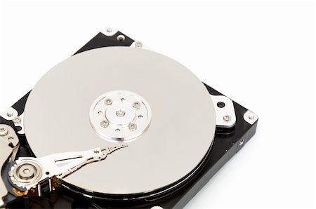 simsearch:400-05238336,k - Opened computer harddisk isolated on white background Stock Photo - Budget Royalty-Free & Subscription, Code: 400-04804062