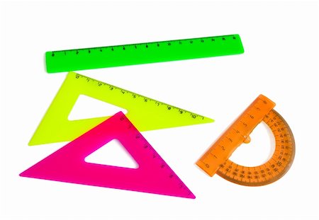 Colored plastic drafting tools - triangles,ruler, protractor isolated on white Stock Photo - Budget Royalty-Free & Subscription, Code: 400-04805534