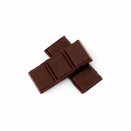 simsearch:400-05136453,k - chocolate pieces islated on a white background Stock Photo - Budget Royalty-Free & Subscription, Code: 400-04805659