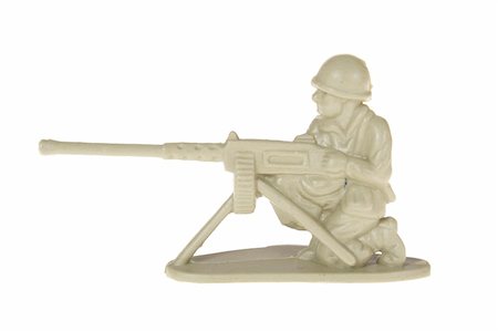 photo de soldat jouet en plastique sur le fond blanc Photographie de stock - Aubaine LD & Abonnement, Code: 400-04806624