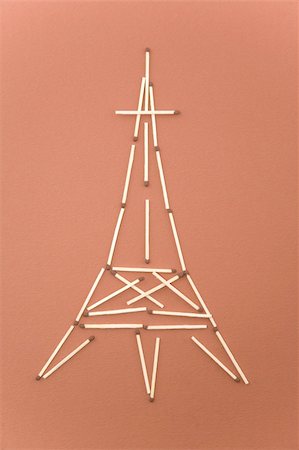 simsearch:400-04564562,k - eiffel tower made of matches on red background Stock Photo - Budget Royalty-Free & Subscription, Code: 400-04806686