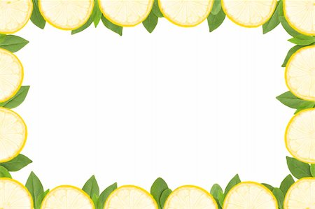 simsearch:400-04716078,k - frame made of yellow lemon slices and green leaves on white background Stock Photo - Budget Royalty-Free & Subscription, Code: 400-04806842