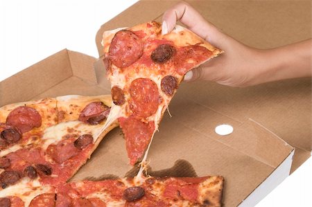 simsearch:400-04479187,k - spicy pizza on cardboard box with hand Stock Photo - Budget Royalty-Free & Subscription, Code: 400-04806961