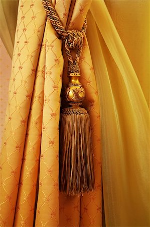 red and gold fabric for curtains - curtain with an ornament in the modern  apartment Stock Photo - Budget Royalty-Free & Subscription, Code: 400-04808752