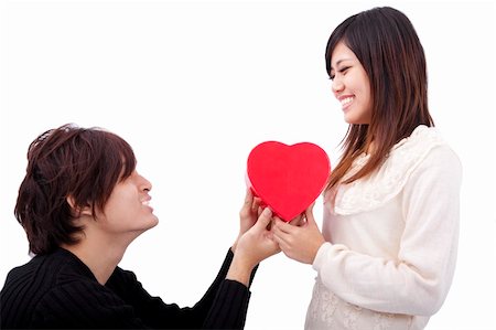 simsearch:400-04739802,k - Asian young Man handing over love gift  to  young woman Stock Photo - Budget Royalty-Free & Subscription, Code: 400-04800393