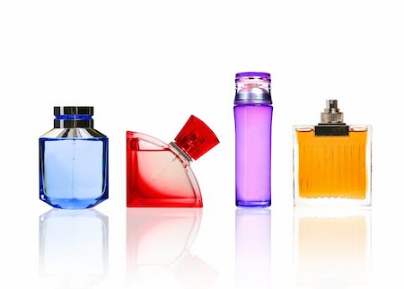 Perfume color glass bottles isolated on white with transparant relection. Stock Photo - Budget Royalty-Free & Subscription, Code: 400-04802617