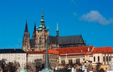 simsearch:400-04015133,k - Hradcany - Cathedral of Saint Vitus in the Prague castle - the coronation cathedral of the Bohemian sovereigns, and the main of the Prague Roman - Catholic arcidiocese. The Gothic buildings was founded in 1344. Prague castle - spacious residential and stronghold area dominantly located above the town, founded about the year 880. Residence of the Bohemian princes and kings, after 1918 of the Presid Stock Photo - Budget Royalty-Free & Subscription, Code: 400-04802644