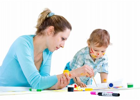 Young mum draws with the son paints. Isolated. Stock Photo - Budget Royalty-Free & Subscription, Code: 400-04803883