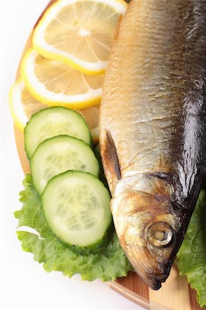 simsearch:400-05731297,k - fish with lemon and vegetables close up Stock Photo - Budget Royalty-Free & Subscription, Code: 400-04814036