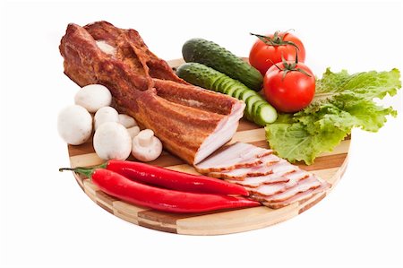 simsearch:400-05731297,k - sausage on plate with vegetables isolated on white Stock Photo - Budget Royalty-Free & Subscription, Code: 400-04814044