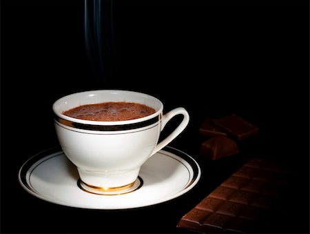 simsearch:700-03698239,k - A cup of luxury chocolate drink & chocolate bar, on black background Stock Photo - Budget Royalty-Free & Subscription, Code: 400-04815045