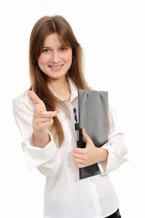 girl pointing at you  with a folder, isolated on white background Photographie de stock - Aubaine LD & Abonnement, Code: 400-04815742