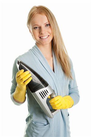 simsearch:400-07902993,k - Cheerful woman with handheld vacuum cleaner. Isolated on white Photographie de stock - Aubaine LD & Abonnement, Code: 400-04811115