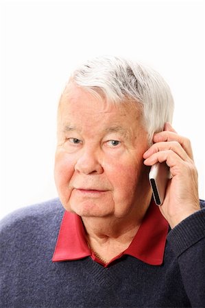 phone one person adult smile elderly - A portrait of an elderly man talking on the phone against white background Stock Photo - Budget Royalty-Free & Subscription, Code: 400-04811362