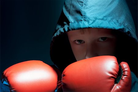 fit black boy - The little boy - boxer in a sport suit. Dark blue. Stock Photo - Budget Royalty-Free & Subscription, Code: 400-04812219