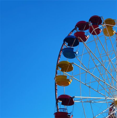 simsearch:400-08403714,k - Ferris wheel against blue sky Stock Photo - Budget Royalty-Free & Subscription, Code: 400-04812919