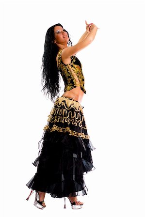 simsearch:400-05701566,k - Latina dancer - beautiful woman with long black hair wearing stage vivid dress isolated on white Photographie de stock - Aubaine LD & Abonnement, Code: 400-04824060