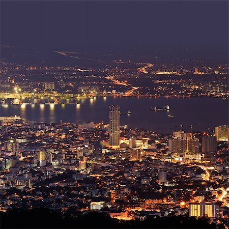 simsearch:400-05706130,k - City night scene of harbor and tower in Penang, Malaysia, Asia. Stock Photo - Budget Royalty-Free & Subscription, Code: 400-04824176