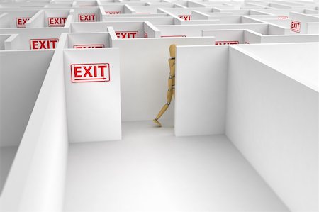 simsearch:400-05744172,k - Mannequin following exit signs out of a complicated maze Stock Photo - Budget Royalty-Free & Subscription, Code: 400-04824658