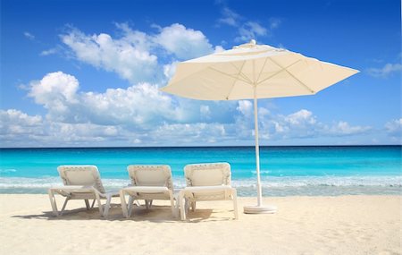 simsearch:400-04329339,k - Caribbean beach parasol white umbrella and hammocks turquoise sea Stock Photo - Budget Royalty-Free & Subscription, Code: 400-04825421