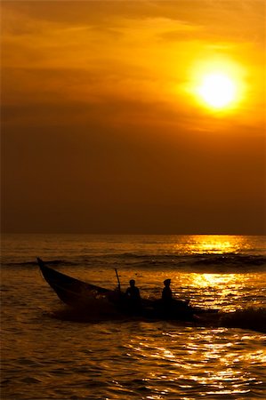 simsearch:400-07748817,k - The fisherman at work in the sunset. Stock Photo - Budget Royalty-Free & Subscription, Code: 400-04829890