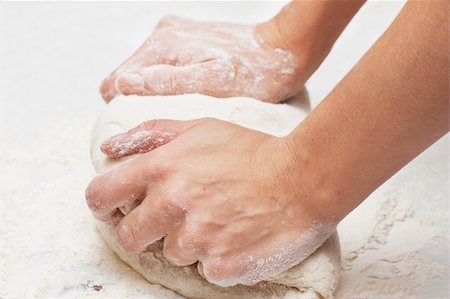 simsearch:649-06845217,k - Pair of hands kneading pizza dough. Stock Photo - Budget Royalty-Free & Subscription, Code: 400-04820596
