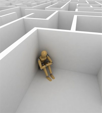 sensitive - Depressed mannequin sitting in the corner of a big maze Stock Photo - Budget Royalty-Free & Subscription, Code: 400-04822545