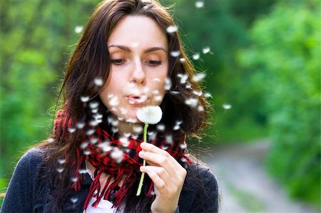 simsearch:400-04399510,k - Girl blowing on white dandelion in the forest Stock Photo - Budget Royalty-Free & Subscription, Code: 400-04822669