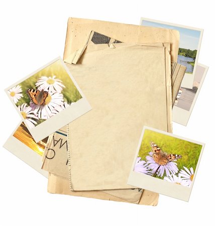 simsearch:400-05892111,k - Frame with old paper and photos. Objects isolated over white Stock Photo - Budget Royalty-Free & Subscription, Code: 400-04823039
