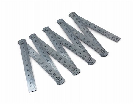 simsearch:600-06702130,k - stainless steel  folding ruler isolated on white Stock Photo - Budget Royalty-Free & Subscription, Code: 400-04823203
