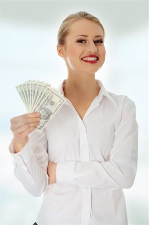 simsearch:400-05718324,k - Businesswoman with dollars Stock Photo - Budget Royalty-Free & Subscription, Code: 400-04835459