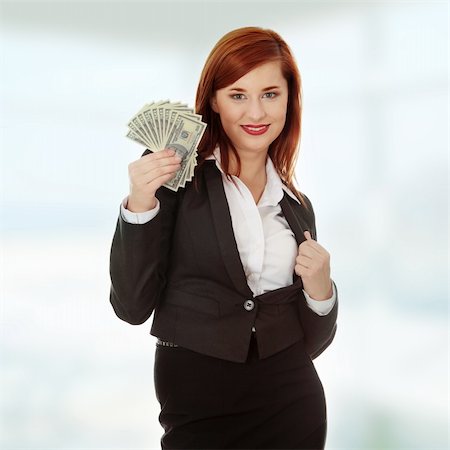 simsearch:400-05715208,k - Businesswoman holding dollars Stock Photo - Budget Royalty-Free & Subscription, Code: 400-04835451