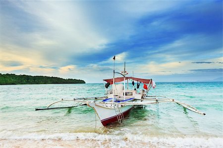 simsearch:400-04418173,k - Traditional Philippine boat in the tropical lagoon Stock Photo - Budget Royalty-Free & Subscription, Code: 400-04836055