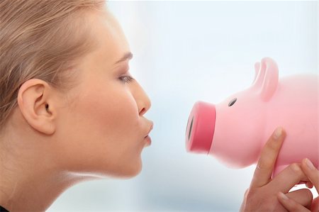 rich women with money laughing - Businesswoman holding piggy bank. Isolated on white background Stock Photo - Budget Royalty-Free & Subscription, Code: 400-04836216