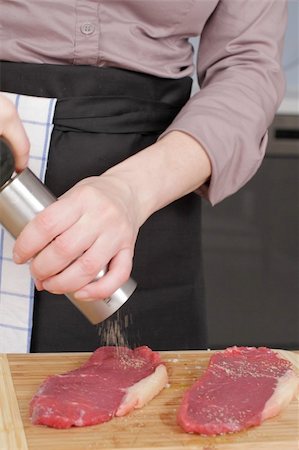 a rare rump steak is getting prepared Stock Photo - Budget Royalty-Free & Subscription, Code: 400-04838310