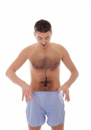 penis men - Young handsome man looking in his pants Stock Photo - Budget Royalty-Free & Subscription, Code: 400-04838648