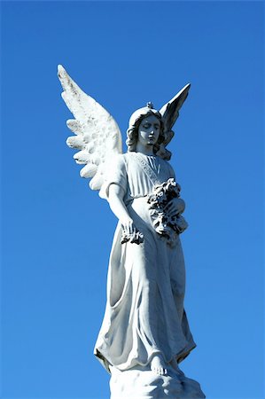 A Angel statue with blue sky Stock Photo - Budget Royalty-Free & Subscription, Code: 400-04830076