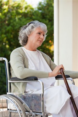 Senior woman in her wheelchair at home Stock Photo - Budget Royalty-Free & Subscription, Code: 400-04830312