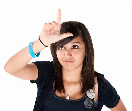 Cute Latino Making the Loser Sign on her Forehead Stock Photo - Budget Royalty-Free & Subscription, Code: 400-04831171