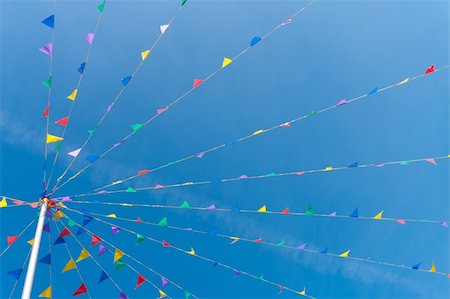 simsearch:400-06628533,k - buntng flags blowing in the wind against a saturated blue sky Stock Photo - Budget Royalty-Free & Subscription, Code: 400-04832241
