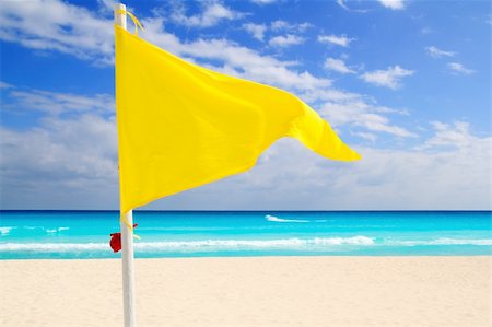 simsearch:400-04329339,k - Beach yellow flag weather wind advice Caribbean turquoise sea Stock Photo - Budget Royalty-Free & Subscription, Code: 400-04832257