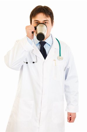 food specialist - Medical doctor  in uniform drinking coffee isolated on white Stock Photo - Budget Royalty-Free & Subscription, Code: 400-04832452