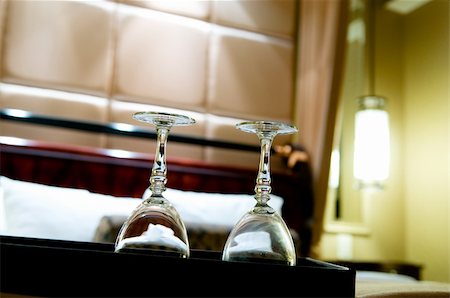 Two glasses on the double bed as romantic concept Stock Photo - Budget Royalty-Free & Subscription, Code: 400-04833034