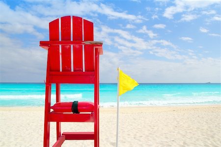 simsearch:400-04329339,k - Baywatch red beach seat yellow wind flag in tropical caribbean sea Stock Photo - Budget Royalty-Free & Subscription, Code: 400-04833079